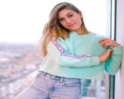 Apart from vlogging she also sells merchandise like crop sweaters, t-shirts on her YouTube channel.